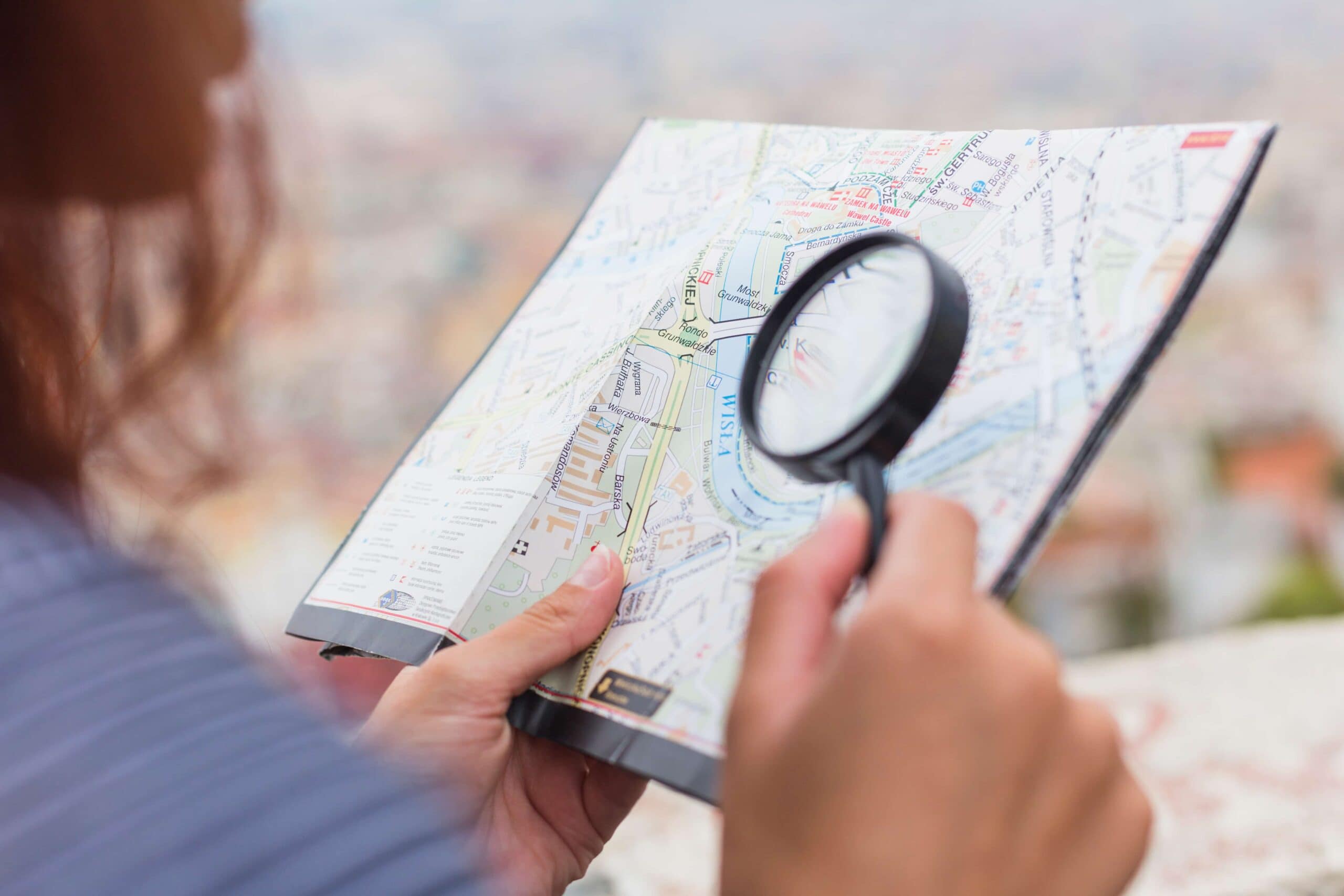 A women looking for an address on the map